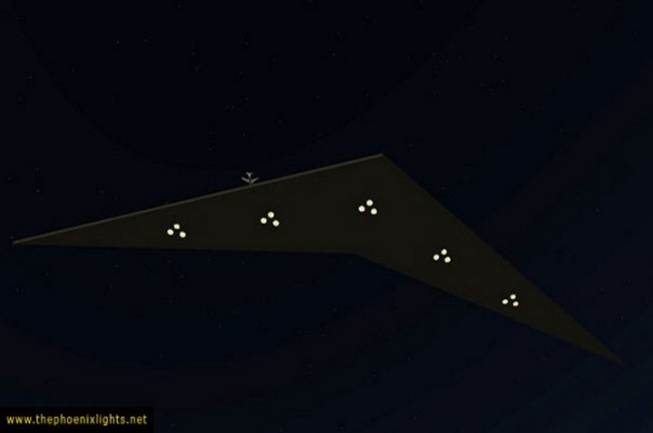 Immense boomerang muni de cinq groupes de trois lumières et croisant un Airbus 319